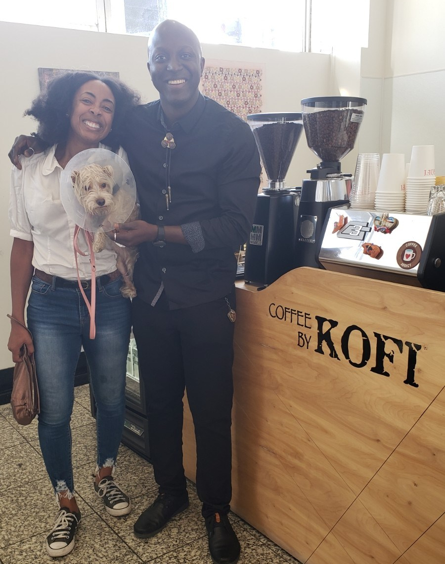 This is Kofi of Coffee by Kofi The Reef | LA Mart, 1933 S Broadway https://www.coffeebykofi.com/ Coffee is bomb and he also designs coasters and the tie he's wearing out of fab buttons!